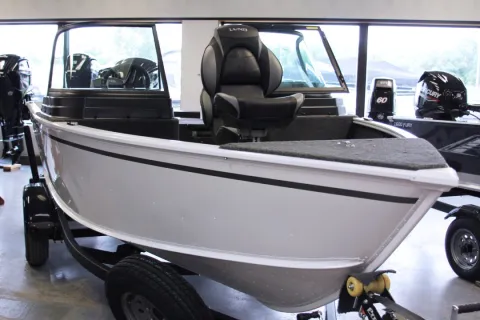Lund 1675 Adventure runabout with 90hp Mercury FourStroke and ShoreLand'r trailer.