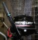 Mercury 3.5 hp lightweight fishing outboard with tiller and integral fuel tank.